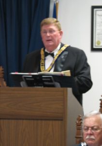 MW Flora presents his message to the Brethren of District 2